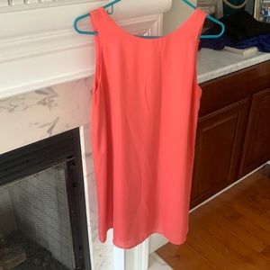 Peach/pink shift dress with bow on the back